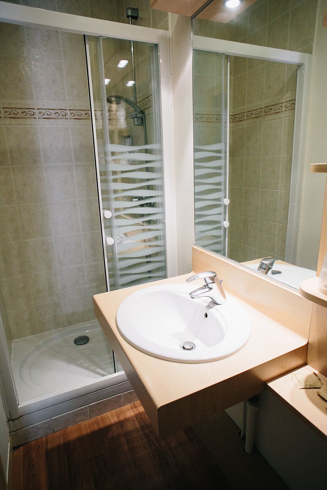 superior quadruple room (shower) | bathroom | free toiletries, hair dryer, towels
