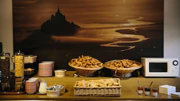 Desayuno buffet (EUR 9 por persona)