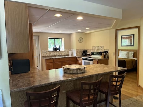 Family Condo, 2 Bedrooms | Soundproofing, iron/ironing board, cribs/infant beds, rollaway beds. Amber's Inn & Suites