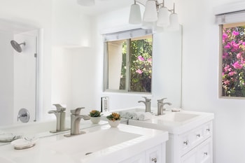 Deluxe Suite, 1 Bedroom | Bathroom | Combined shower/tub, hair dryer, towels at The Three Fifty Hotel, A Kirkwood Collection Hotel