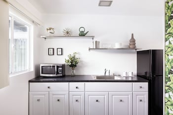  Deluxe Double Room, 1 King and 1 Queen | Private kitchenette | Fridge, coffee/tea maker at The Three Fifty Hotel, A Kirkwood Collection Hotel