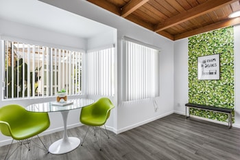 Standard Suite, 1 King Bed | Living area | TV at The Three Fifty Hotel