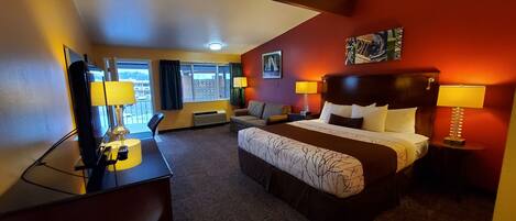 Deluxe kamer, 1 kingsize bed, niet-roken | 1 slaapkamer, luxe beddengoed, een kluis op de kamer