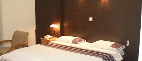 Habitación superior | 1 dormitorio, escritorio, wifi gratis y ropa de cama
