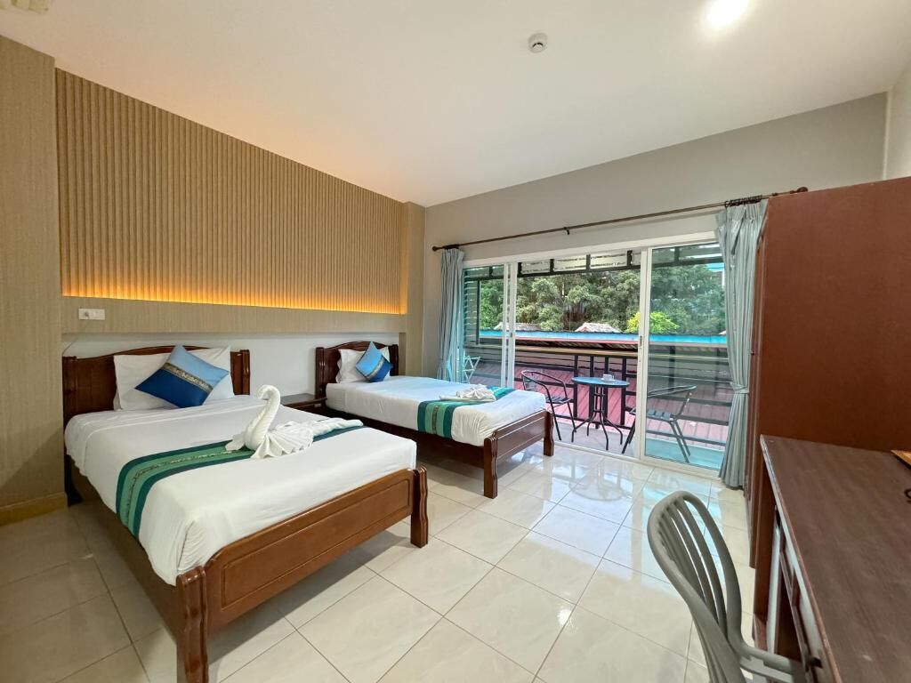 Tvåbäddsrum Deluxe | Sängtillbehör av högsta kvalitet, Select Comfort-madrasser och skrivbord