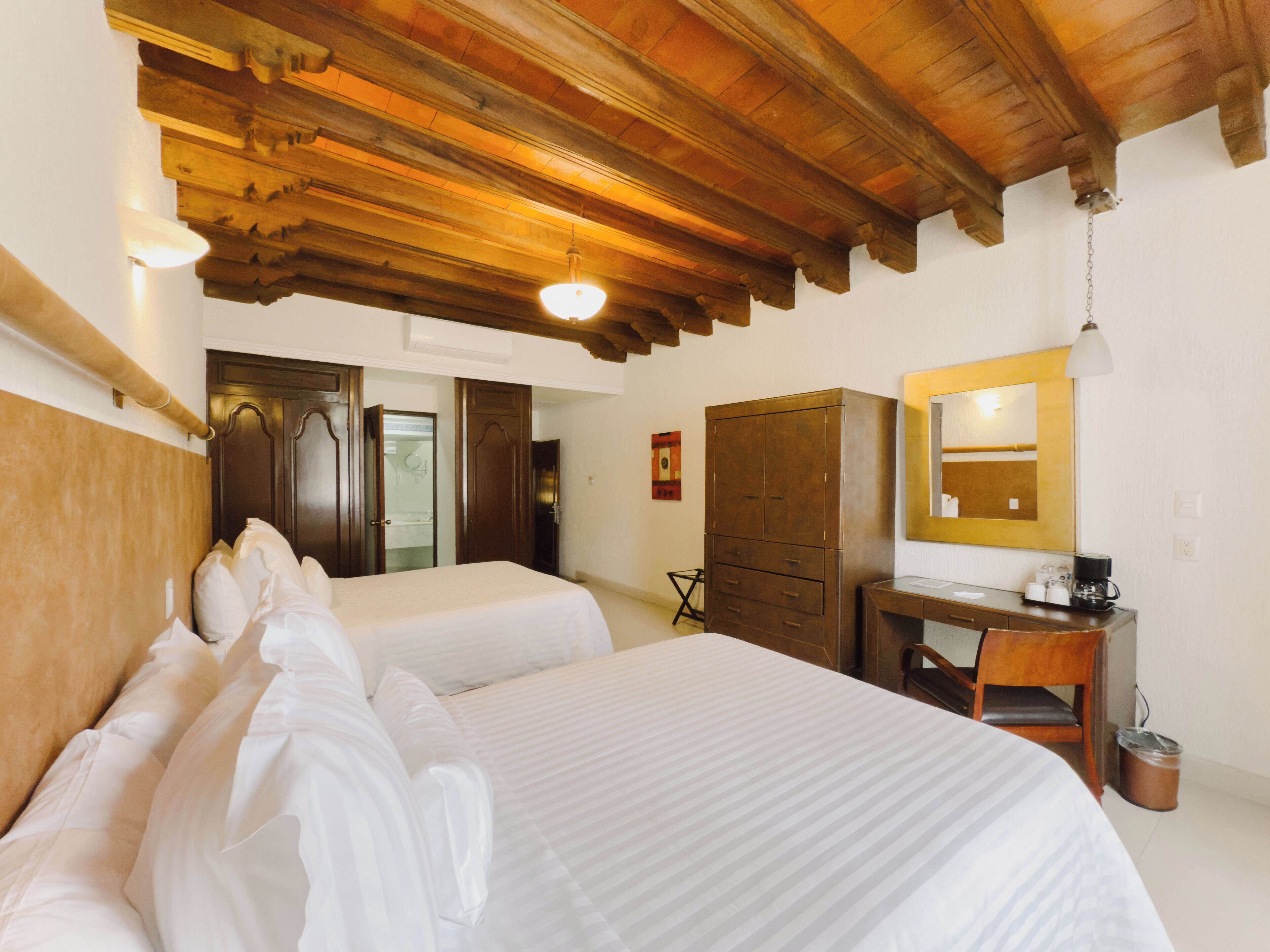 Down comforters, in-room safe, desk, blackout drapes