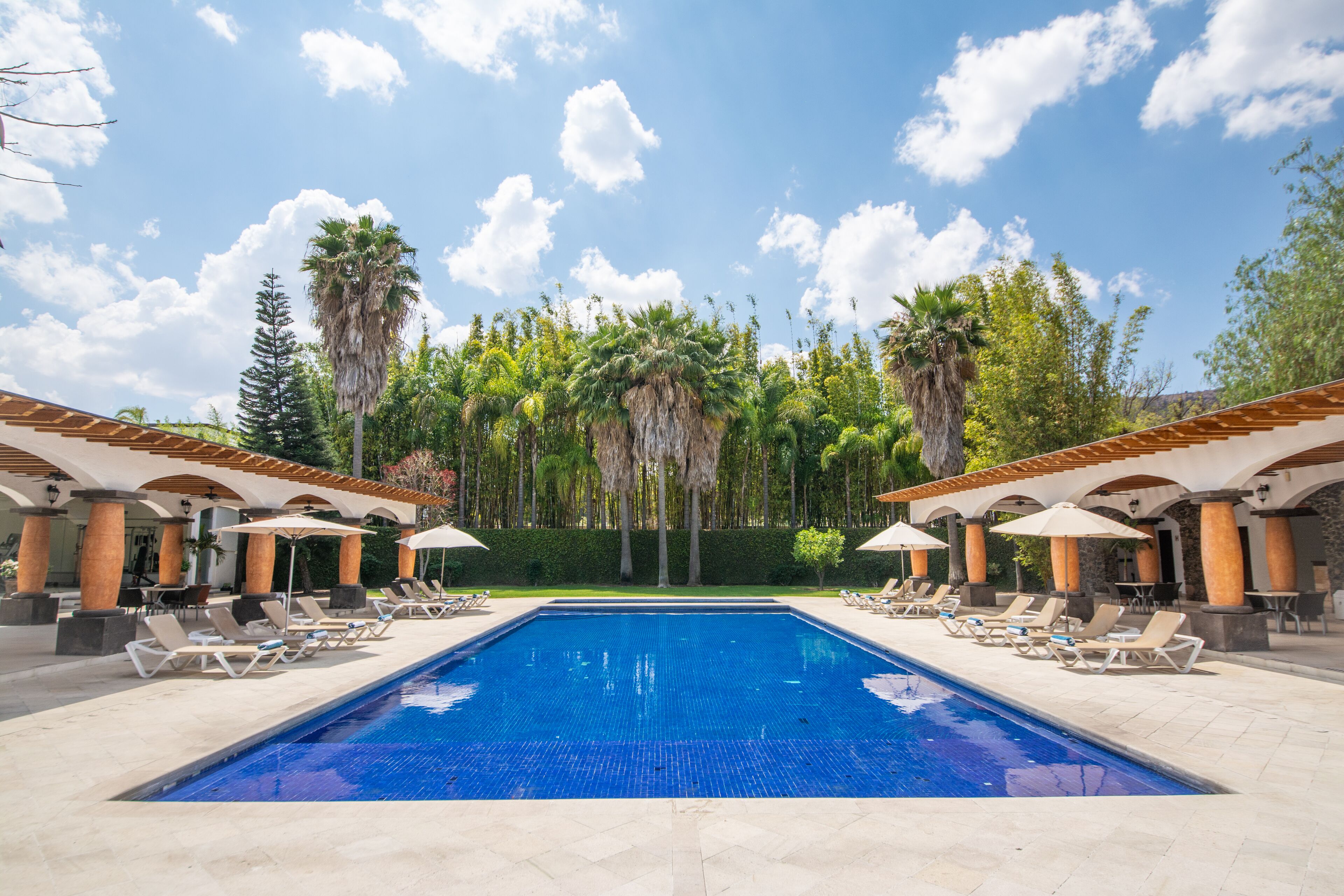 outdoor pool, open 9:00 am to 8:00 pm, free pool cabanas, pool umbrellas