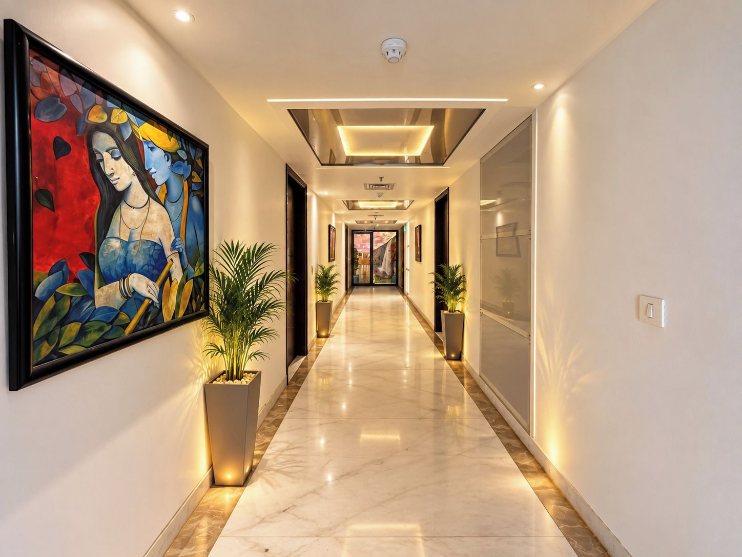 A modern hotel corridor with a marble floor, a large abstract painting on the left, and a ceiling with recessed lighting.