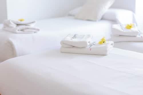 Triple Room | Down comforters, in-room safe, individually decorated, desk