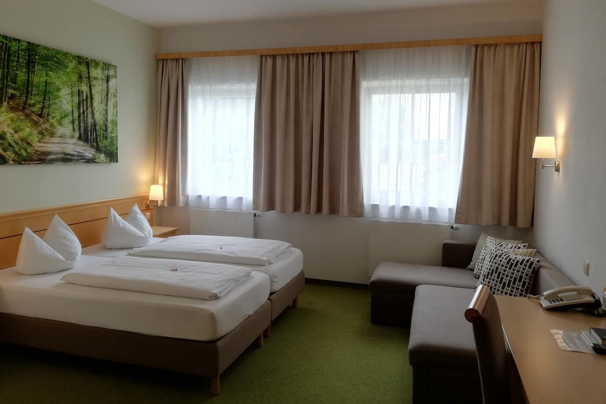 Hypo-allergenic bedding, minibar, in-room safe, desk