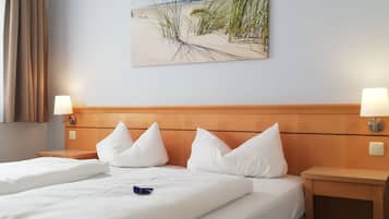 Literie hypoallergénique, minibar, coffres-forts dans les chambres