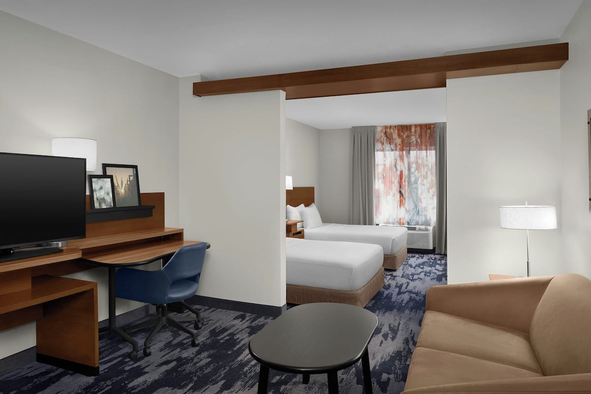 Studio, Multiple Beds | Living area | Flat-screen TV