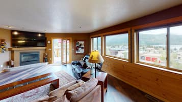 Luxury Apartment, 2 Bedrooms, Fireplace, Mountain View | Living area | 55-inch flat-screen TV with cable channels, TV