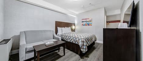 Standard Room, 1 Queen Bed (Non-wheelchair Accessible) | Desk, iron/ironing board, free WiFi, bed sheets