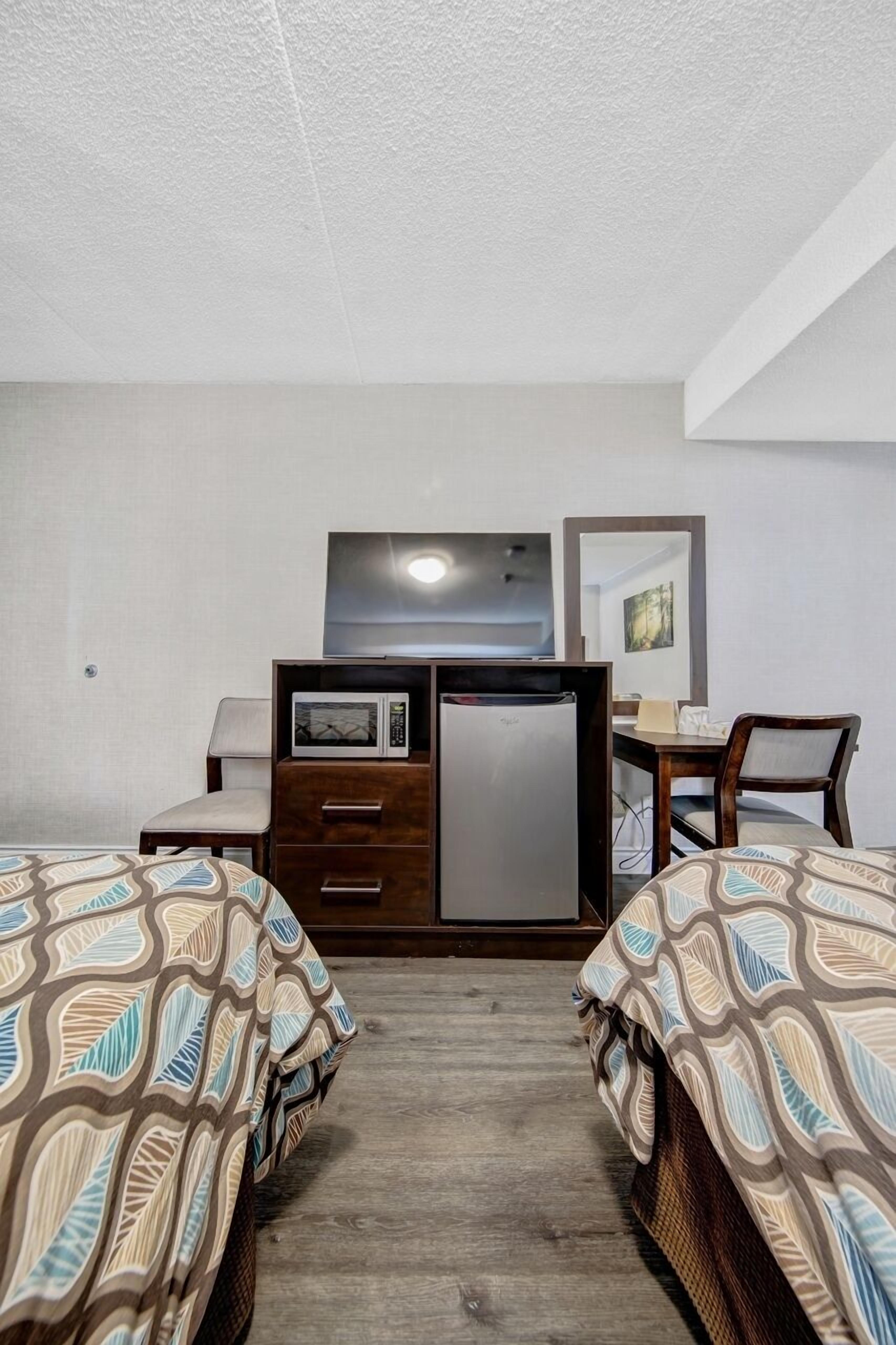 Foto - Deluxe Inn