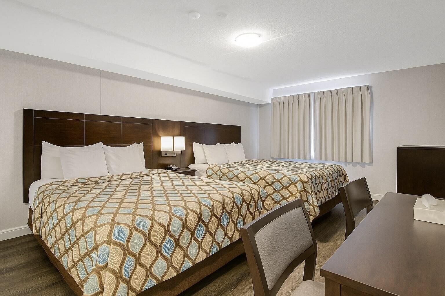 Foto - Deluxe Inn