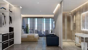 Suite Deluxe | Minibar, caja de seguridad en la habitación y escritorio