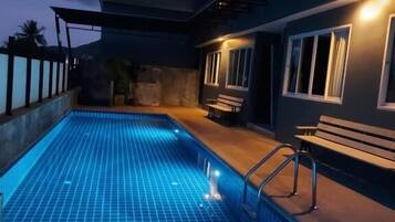 Outdoor pool, open 8:00 AM to 8:00 PM, pool loungers