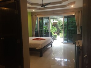 Superior Garden View   with A/C | Caja fuerte, escritorio, camas supletorias y wifi gratis