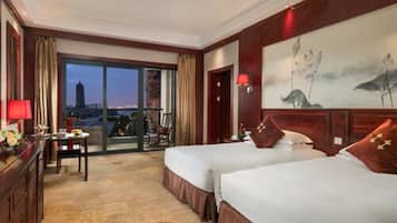 Family Suite | Down comforters, minibar, in-room safe, desk