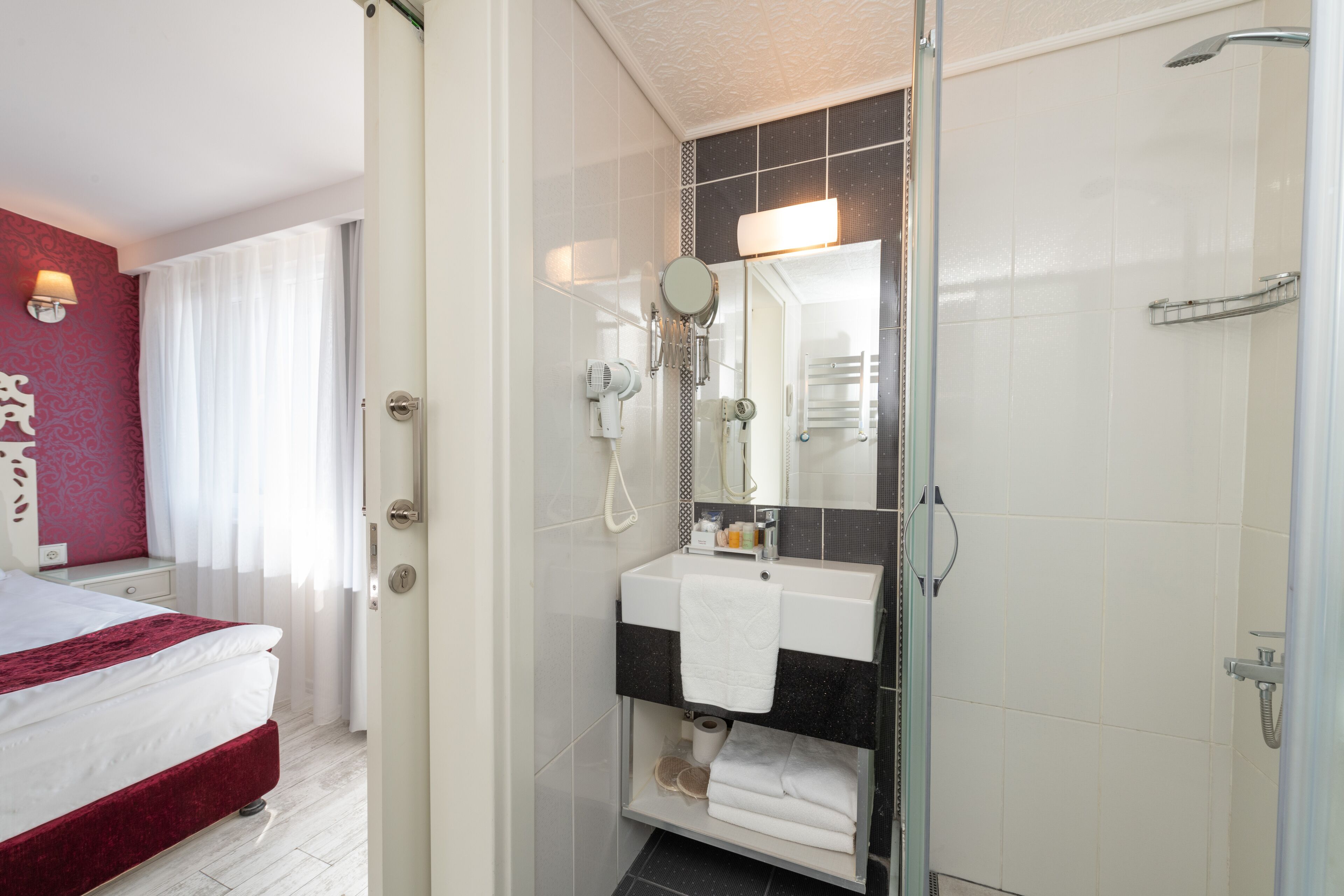 superior double room, balcony, sea view | bathroom | shower, rainfall showerhead, designer toiletries, hair dryer