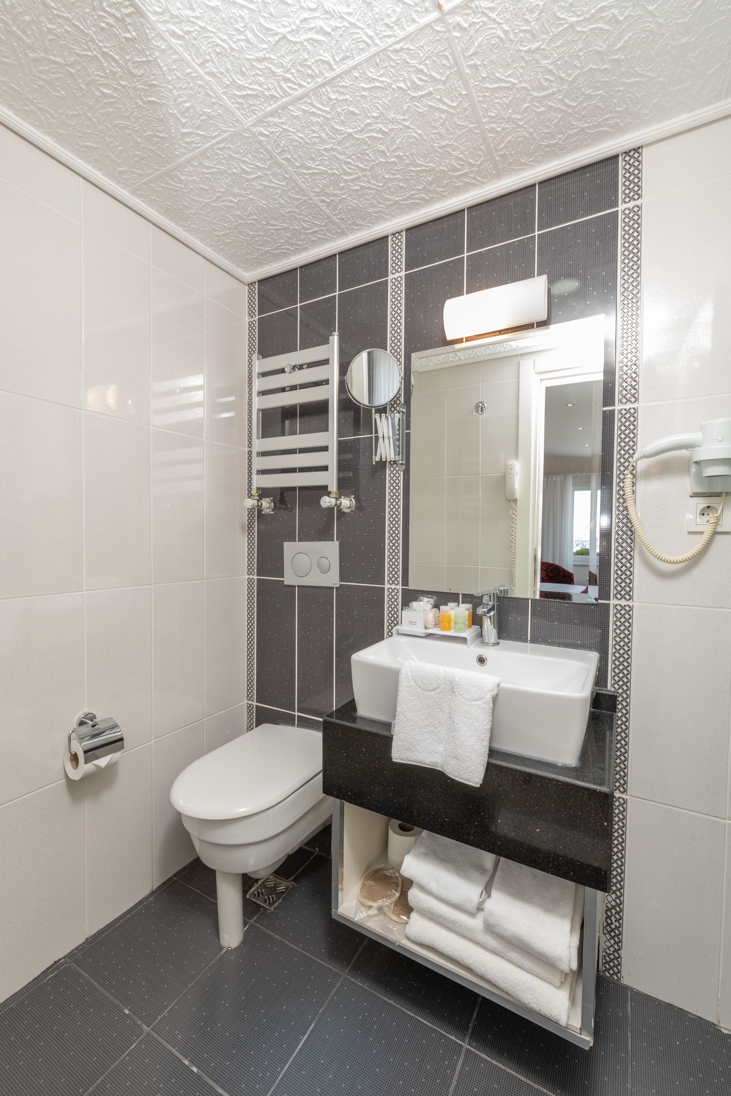 shower, rainfall showerhead, designer toiletries, hair dryer