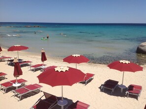 On the beach, white sand, windsurfing, sailing