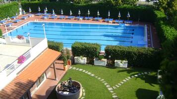 Seasonal outdoor pool, pool umbrellas, sun loungers