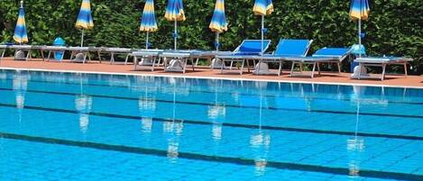 Seasonal outdoor pool, pool umbrellas, sun loungers