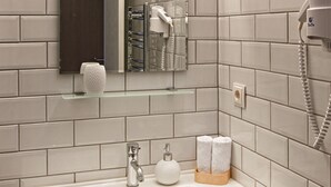 Shower, free toiletries, hair dryer, slippers