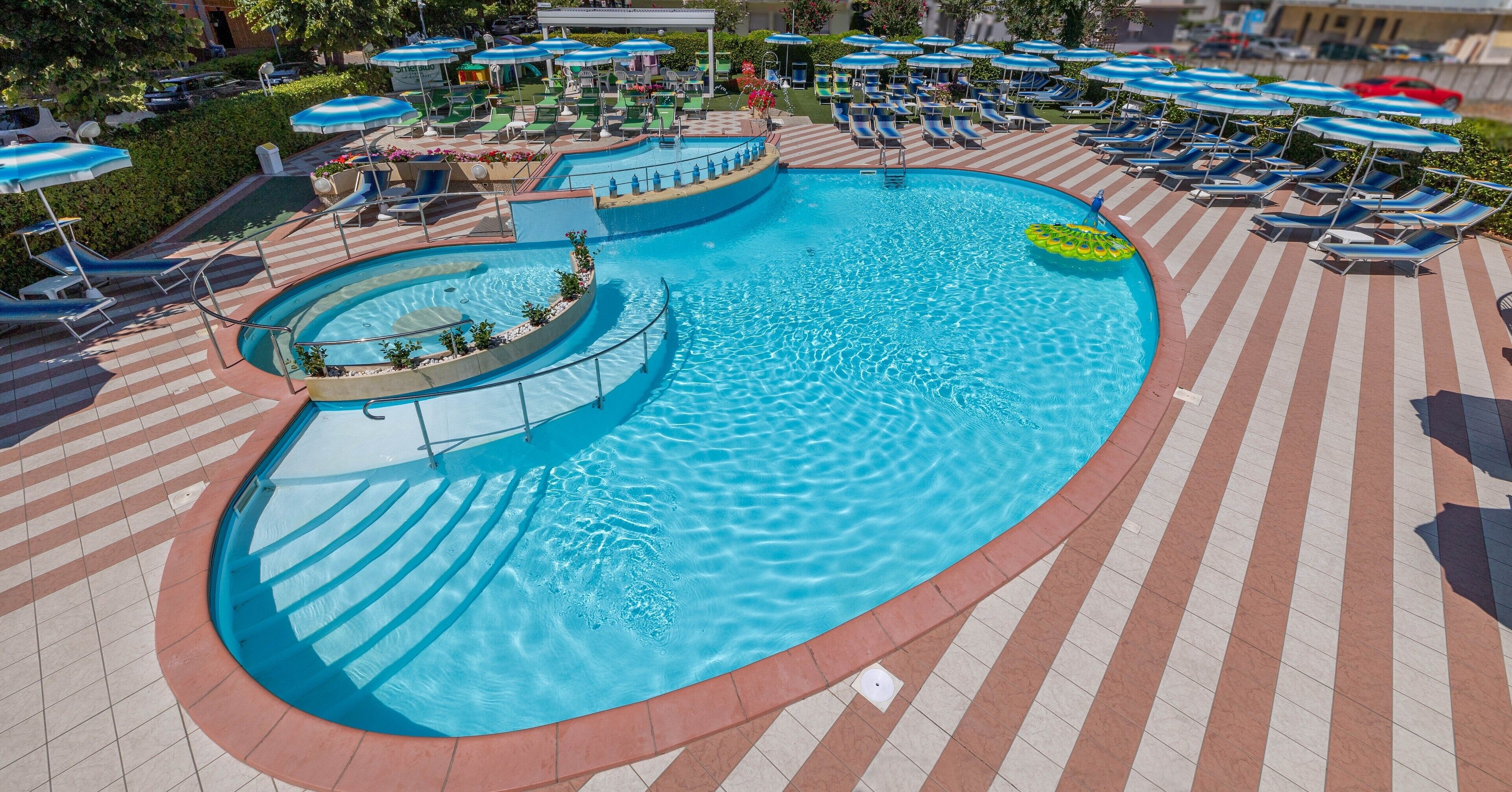 seasonal outdoor pool, pool umbrellas, pool loungers