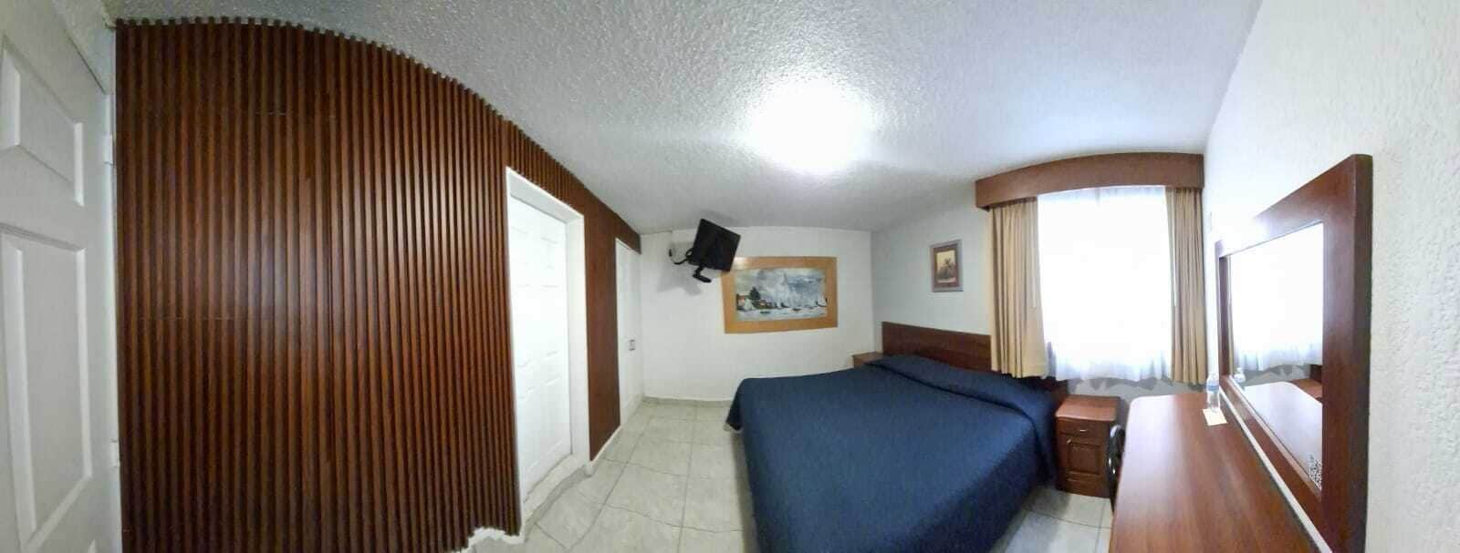 Deluxe Double Room | Laptop workspace, blackout curtains, iron/ironing board, free WiFi