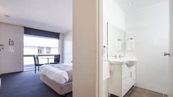 Standard Queen Room | Desk, blackout drapes, iron/ironing board, free WiFi