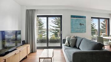 50-inch flat-screen TV with digital channels, TV, iPod dock