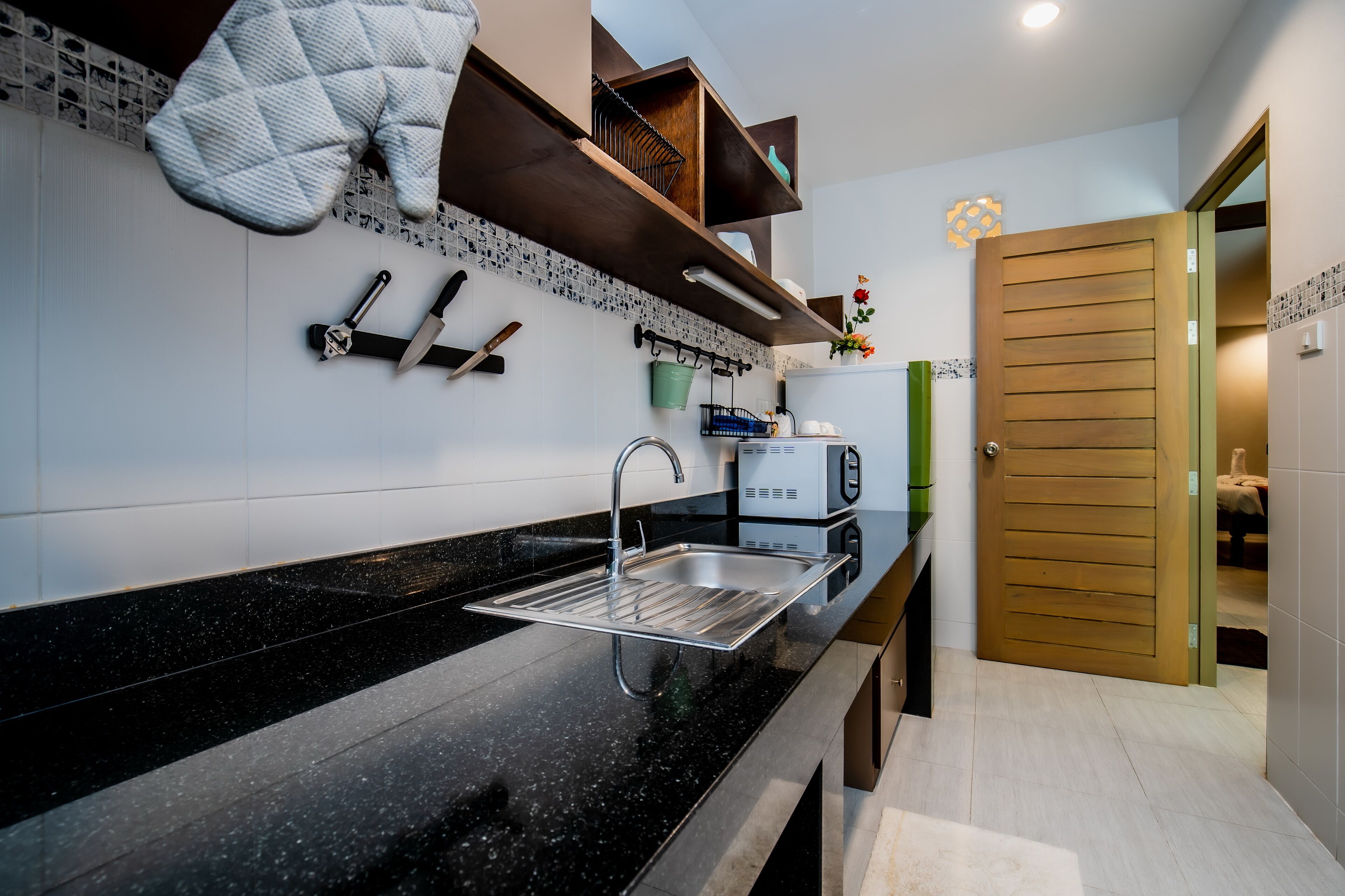 honeymoon studio suite | private kitchen | coffee/tea maker, electric kettle, cleaning supplies