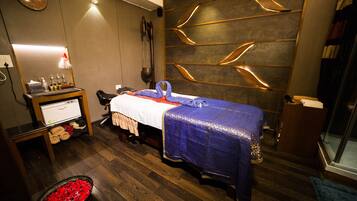 Enjoy a restful stay in this stylishly designed room with a comfortable bed, nightstand, and large window offering a city view.
