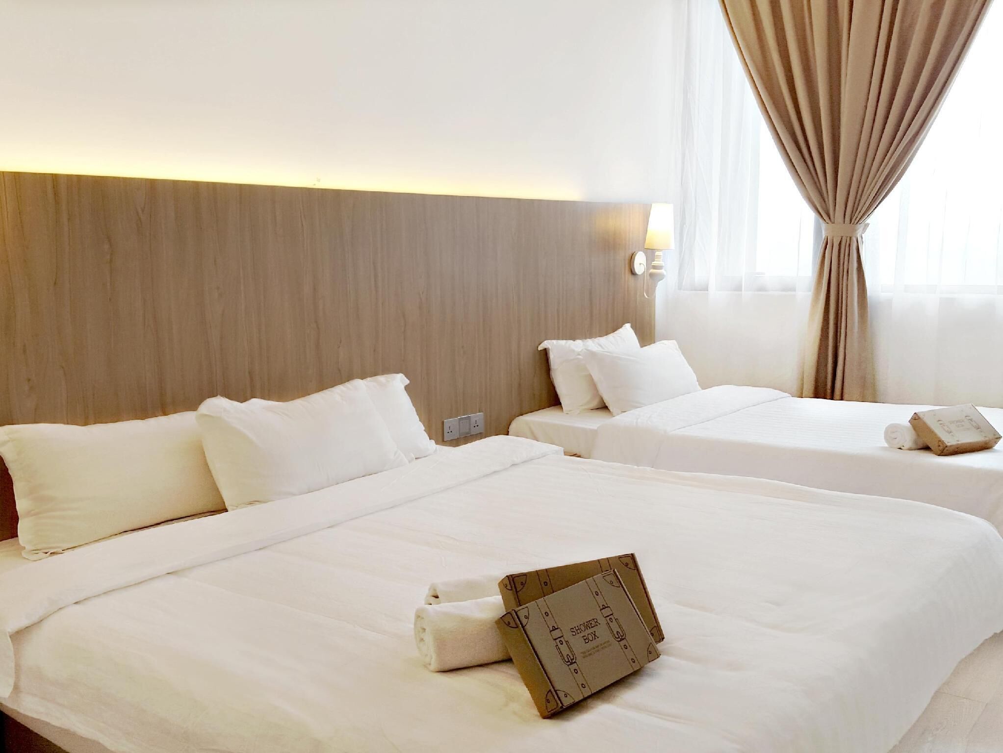 Premium bedding, desk, blackout drapes, soundproofing
