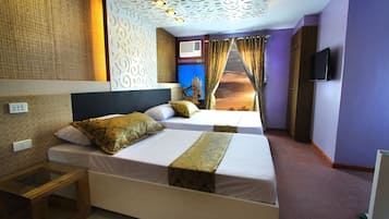 Family Suite | In-room safe, individually decorated, desk, soundproofing