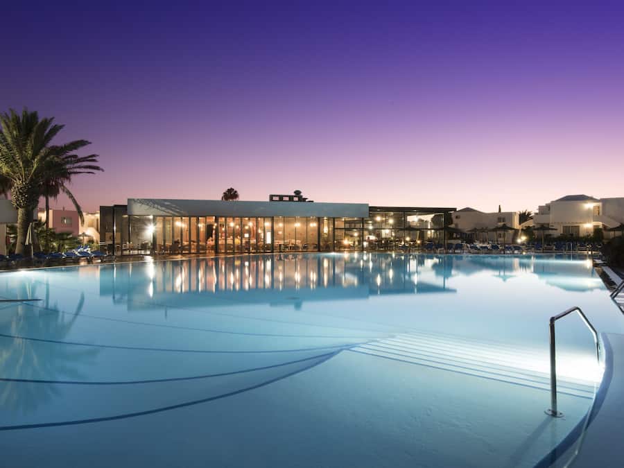 2 outdoor pools, pool umbrellas