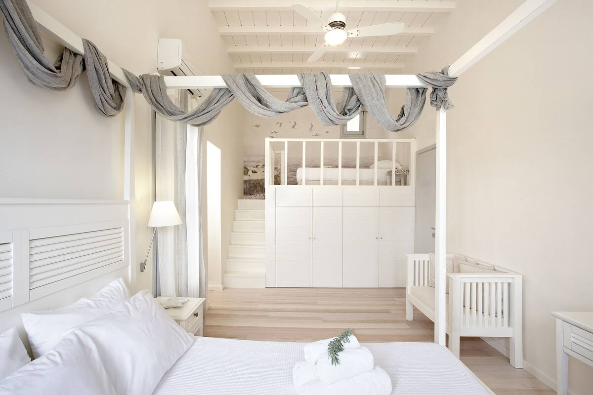 family room, sea view | premium bedding, pillow-top beds, minibar, in-room safe