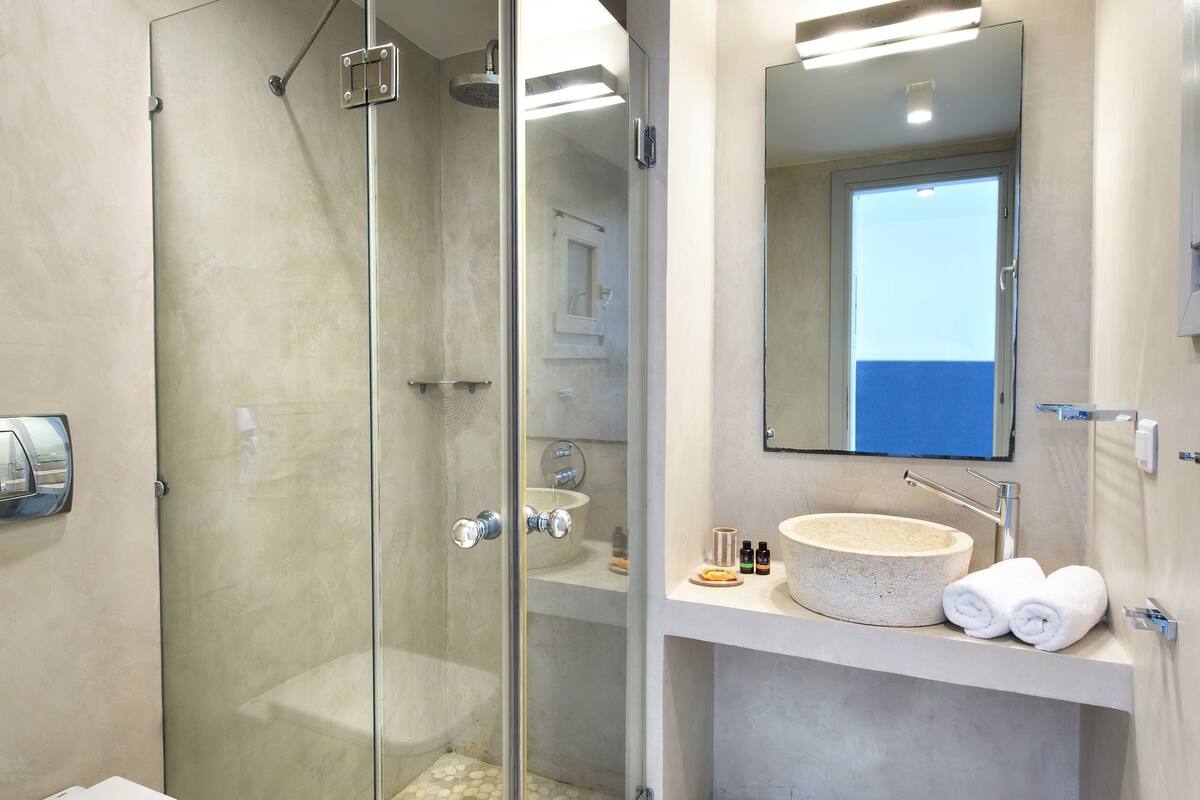 shower, rainfall showerhead, designer toiletries, hair dryer