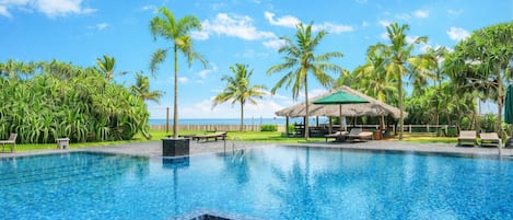 Outdoor pool, pool umbrellas, sun loungers