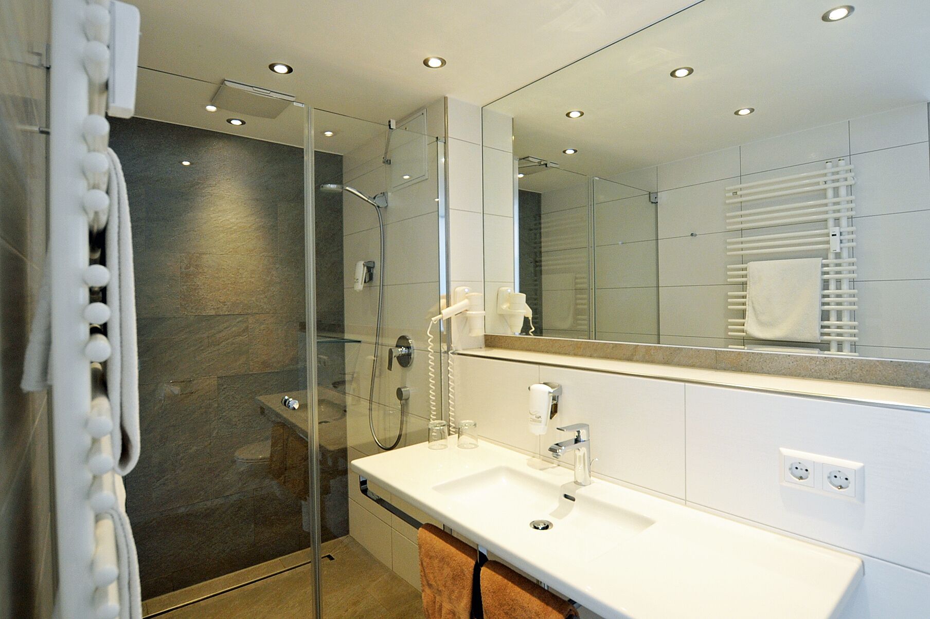 family room | bathroom | rainfall showerhead, towels