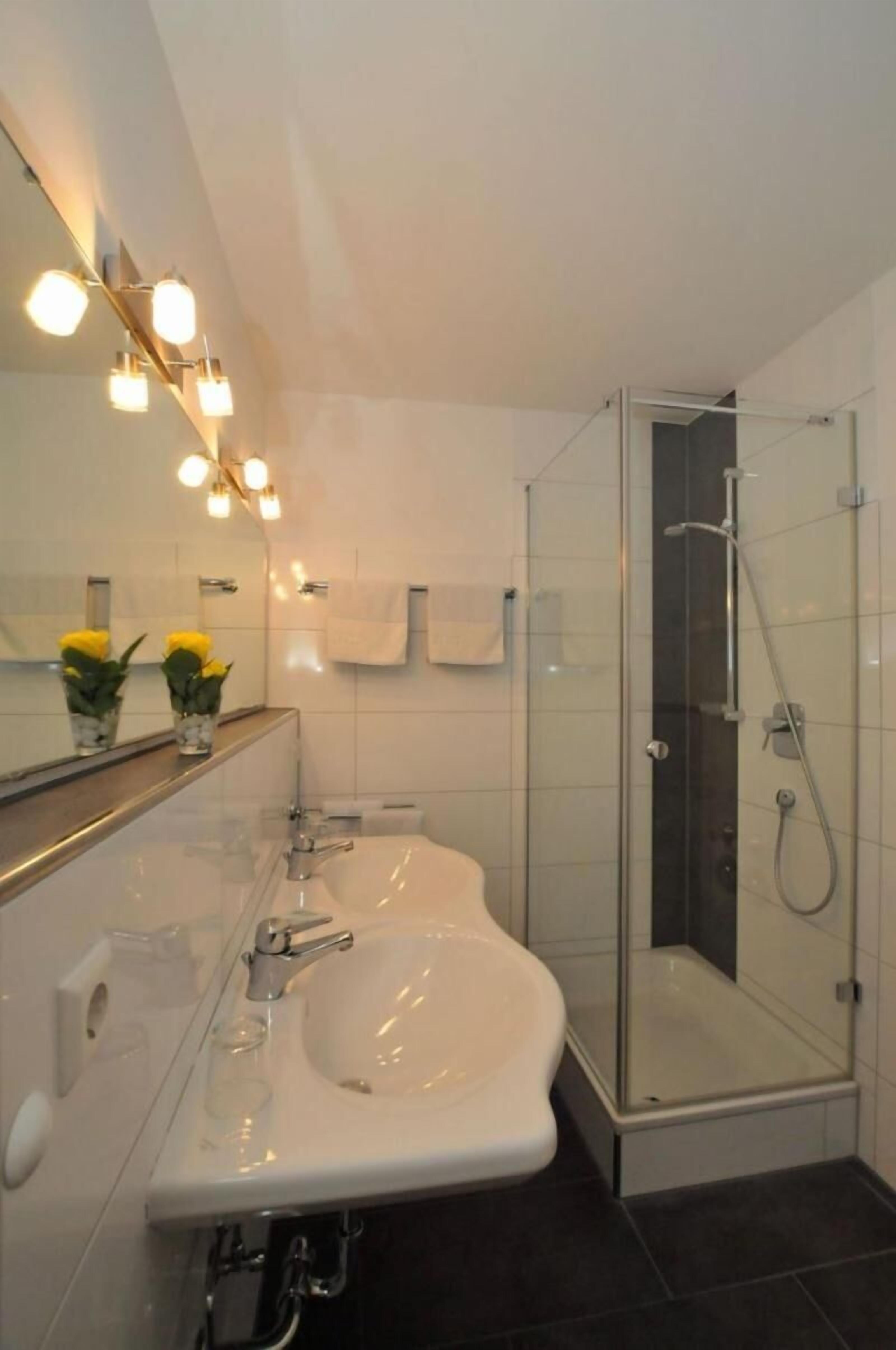 rainfall showerhead, towels