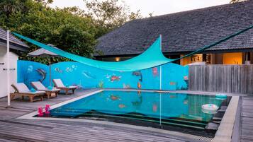 2 outdoor pools, open 6:00 AM to 6:00 PM, pool umbrellas, sun loungers