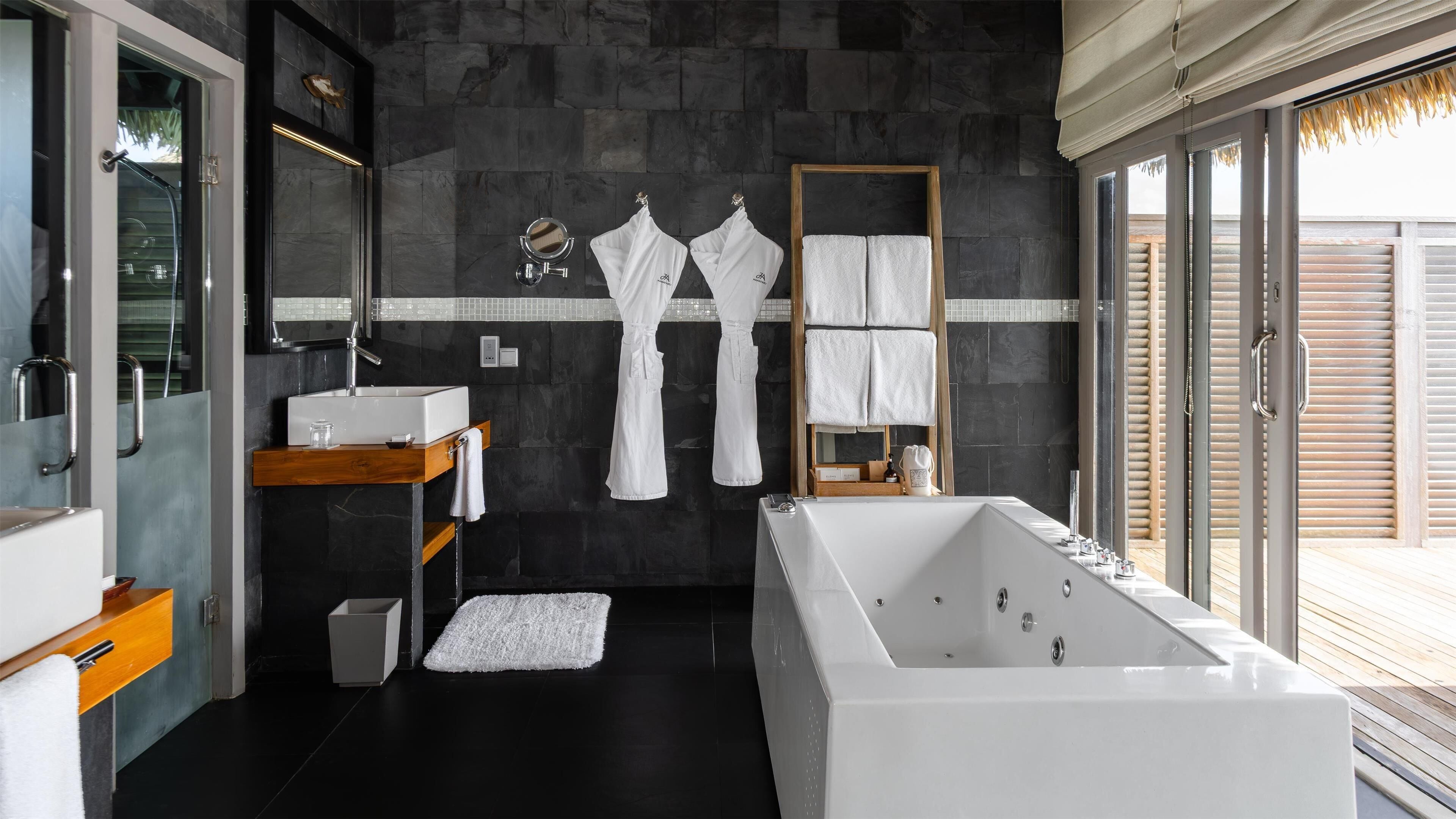 separate bathtub and shower, deep-soaking bathtub, rainfall showerhead