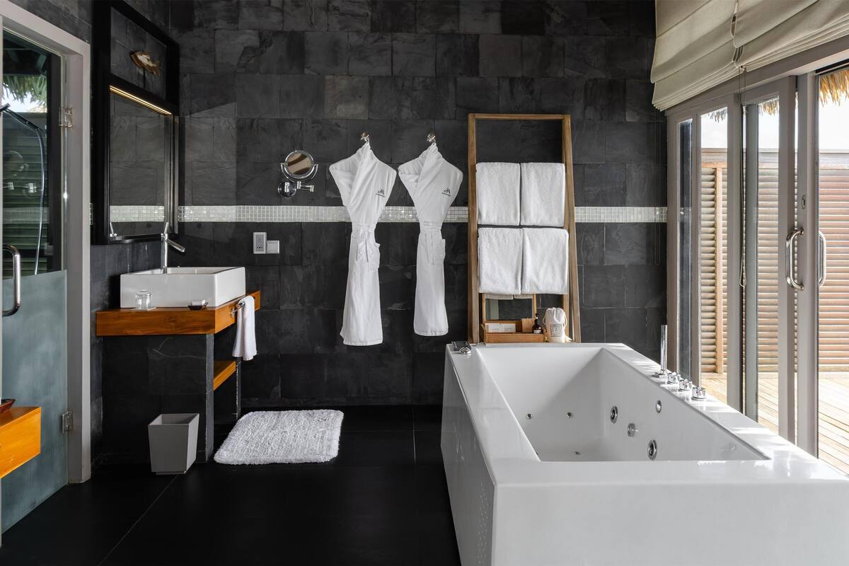 separate bathtub and shower, deep-soaking bathtub, rainfall showerhead