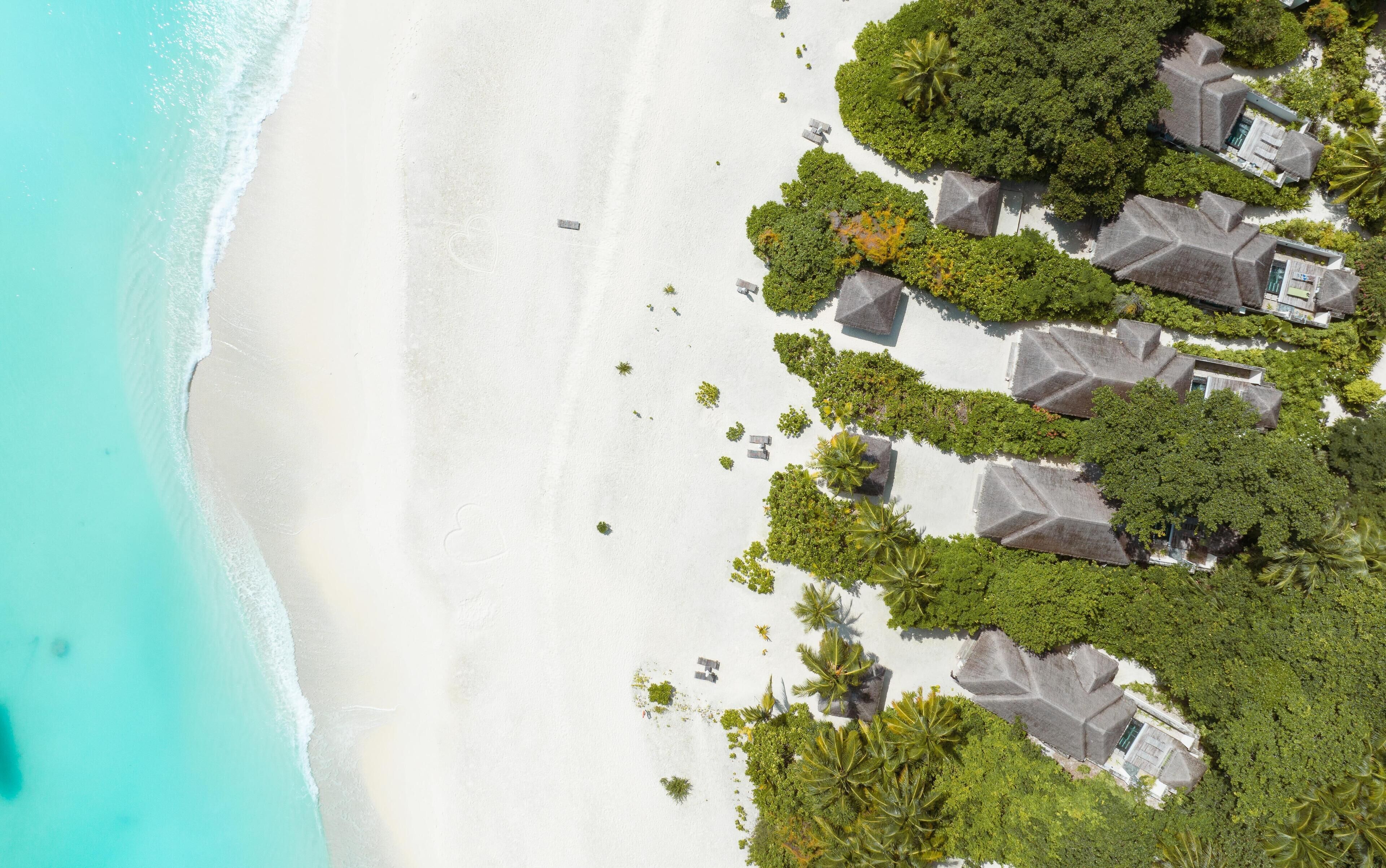 Beach Pool Villa I Complimentary Seaplane for 7 nights and more I Non-Motorized Water Sports | Premium bedding, down comforters, minibar, in-room safe