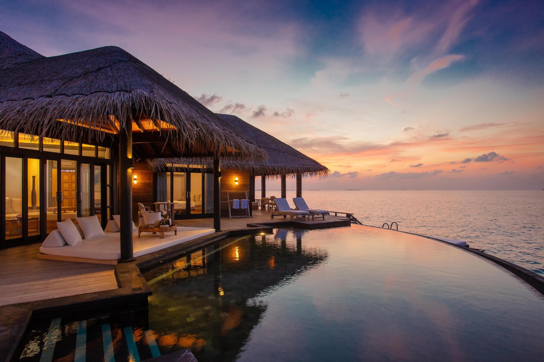 2 outdoor pools, open 6:00 AM to 6:00 PM, pool umbrellas, sun loungers