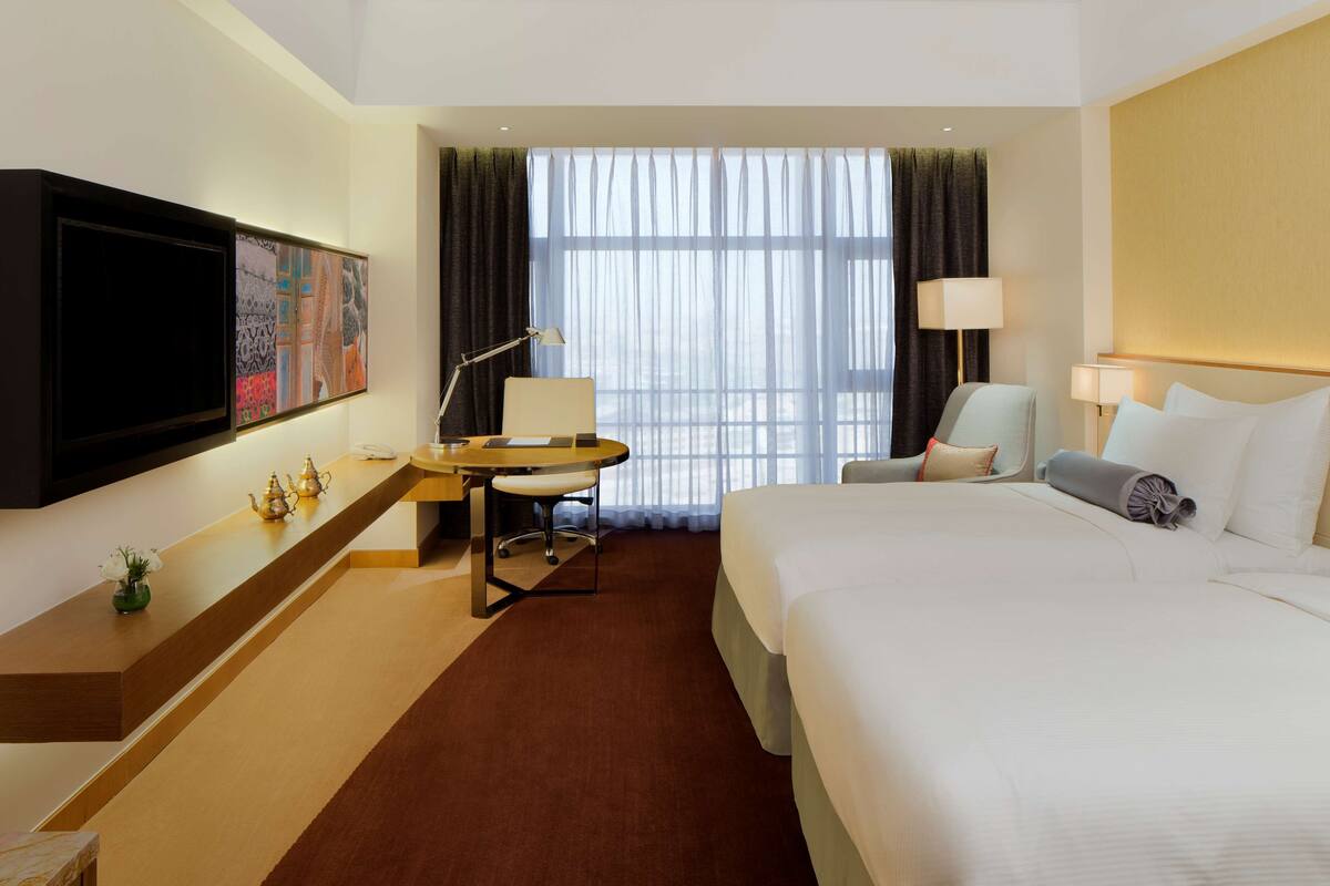 Superior Room | Minibar, in-room safe, desk, iron/ironing board